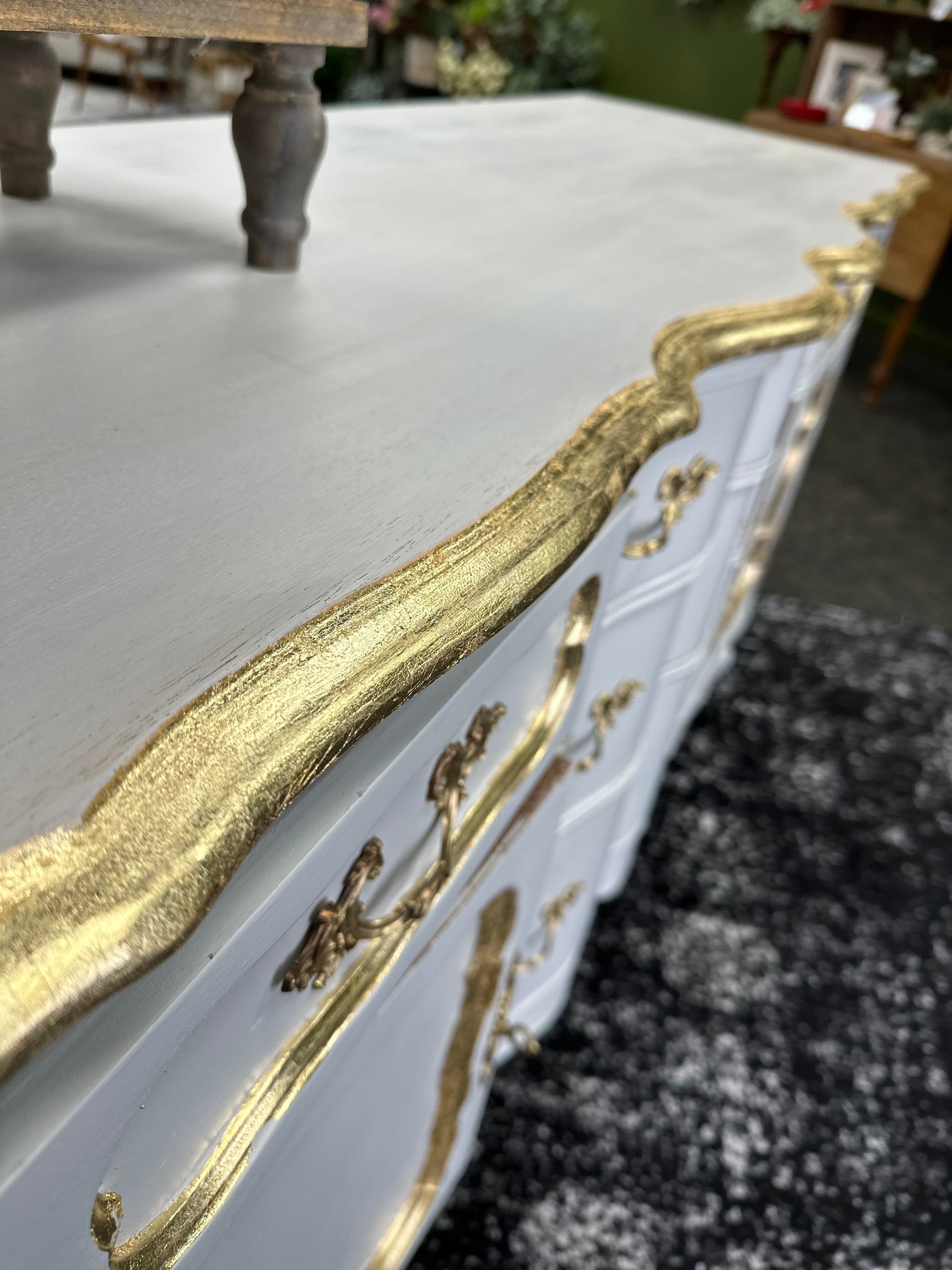 White buffet with Gold Leaf