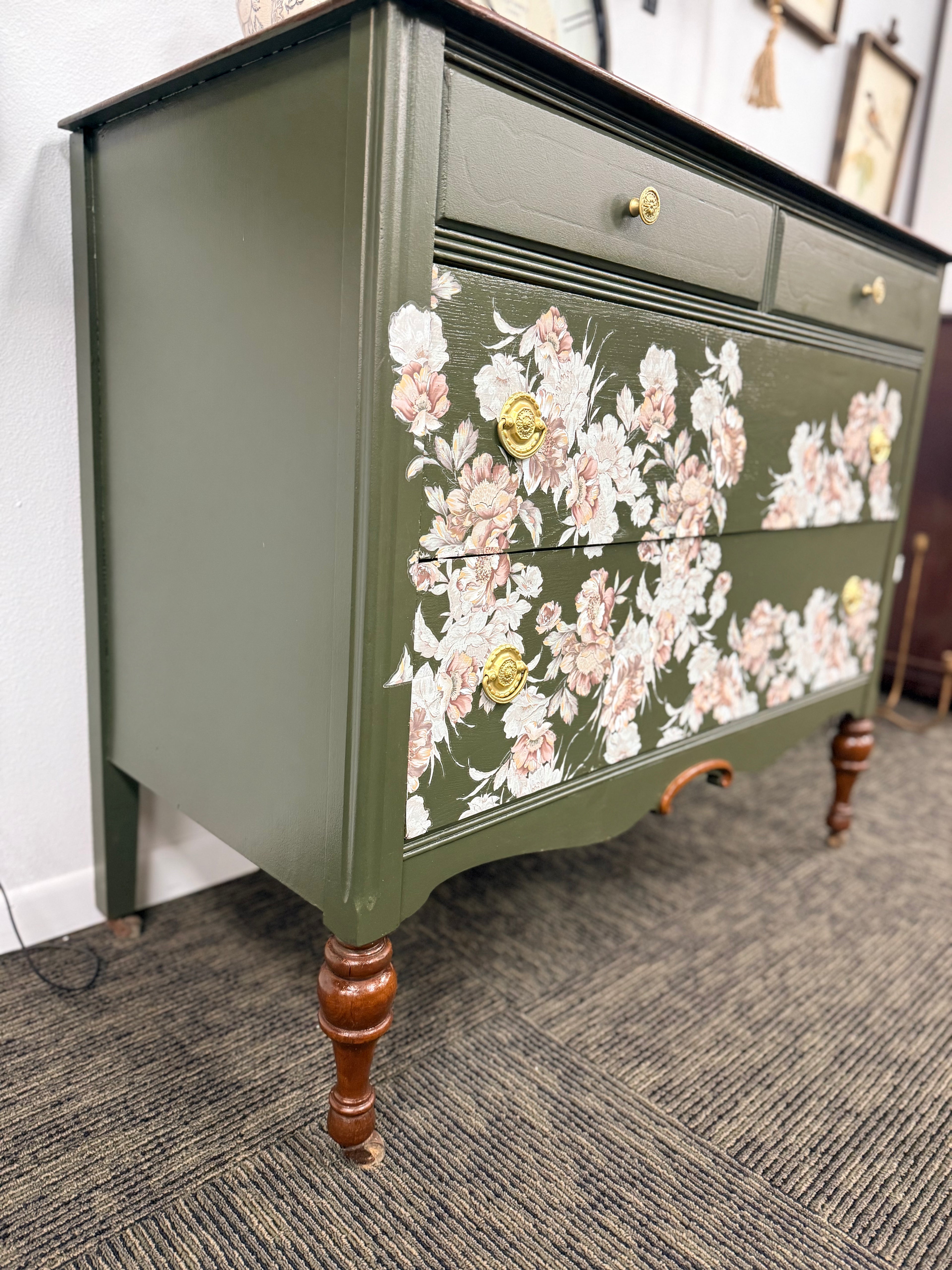 Dark Green Dresser with Floral Accents